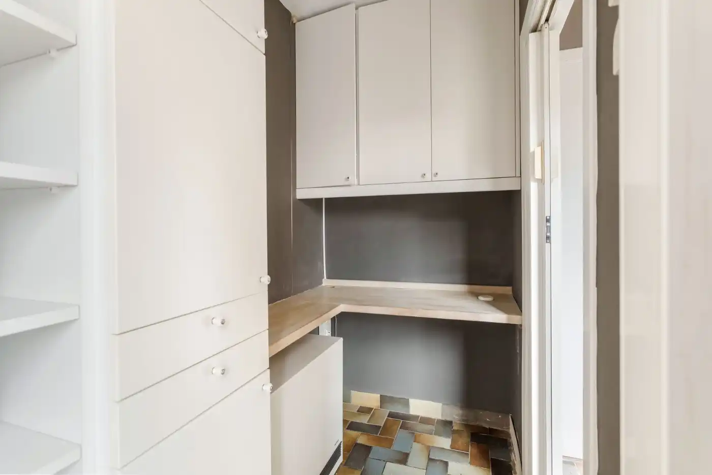 Centraal gelegen, op te frissen woning met 2 à 3 slpk., inpandige garage en tuin foto 12