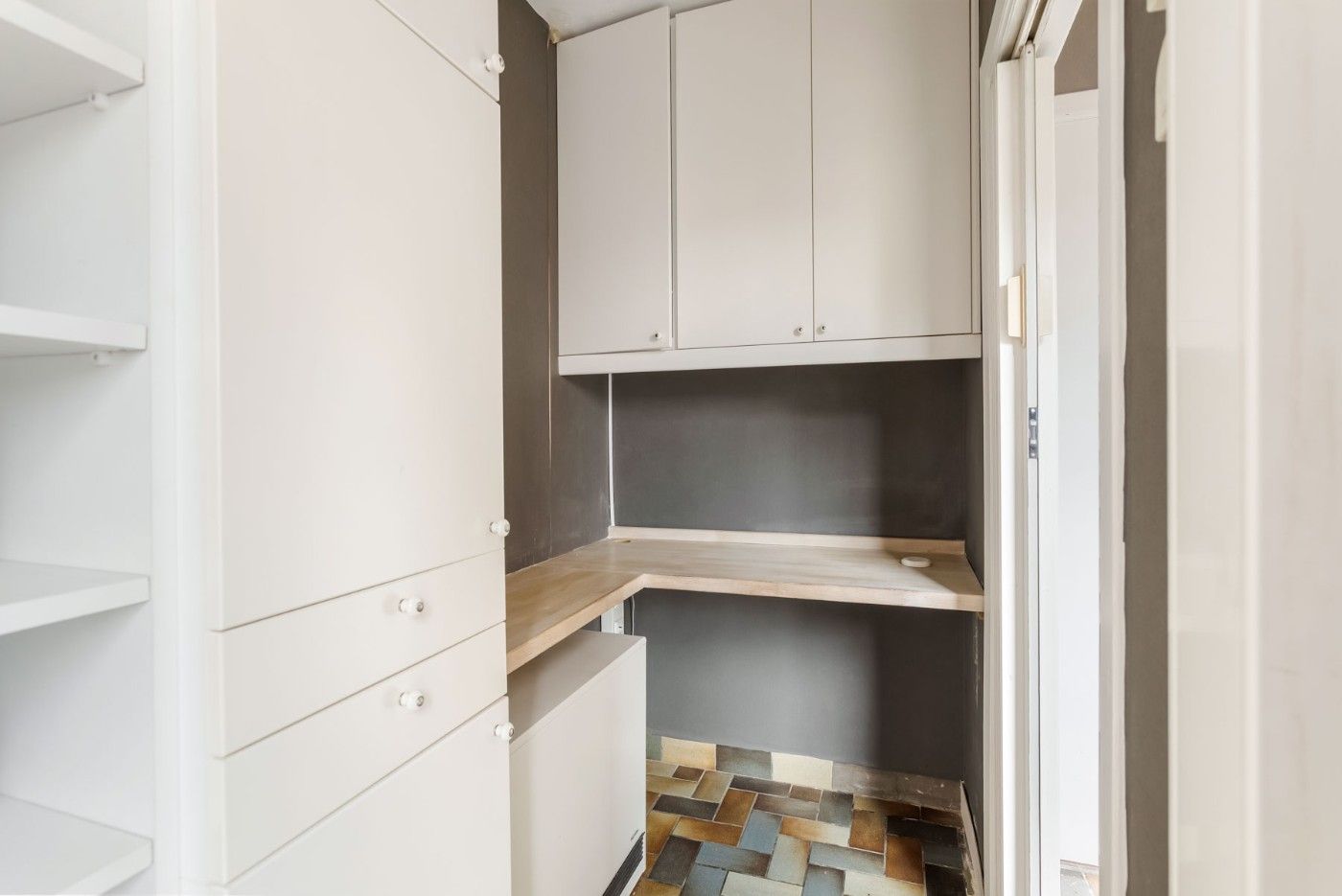 Centraal gelegen, op te frissen woning met 2 à 3 slpk., inpandige garage en tuin foto 12