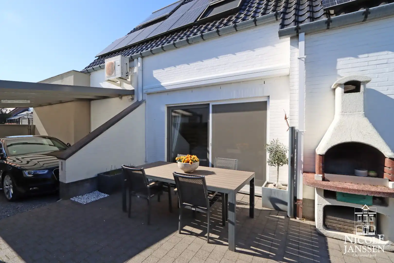 Instapklare woning met ruimte voor praktijk en mooie ingesloten tuin in Bree centrum foto 33