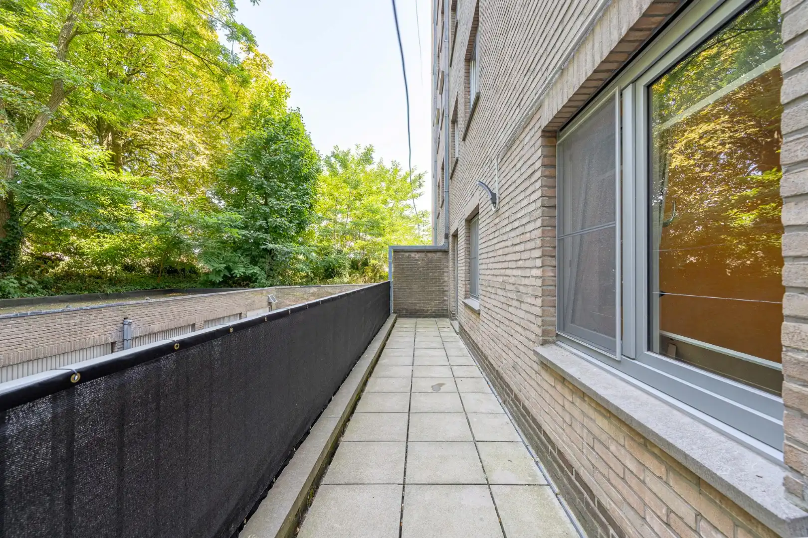 Recent gerenoveerd appartement met 3 slaapkamers, 2 terrassen en garage op centrale ligging met vlotte verbinding in Roeselare foto 4