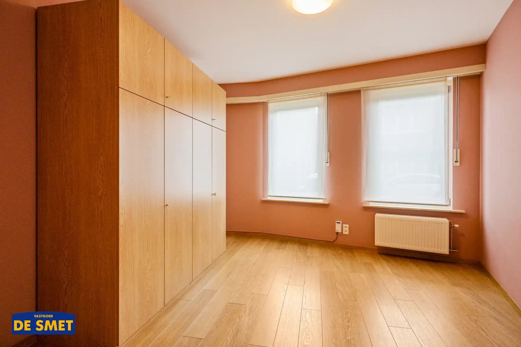 Gelijkvloers appartement met tuin, autostaanplaats én kelder foto 12