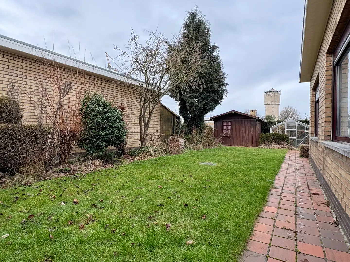 Gelijkvloerse woning op 408m² met 3slks, garage en tuin. foto 17