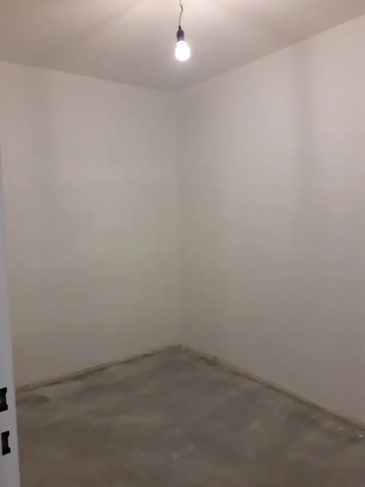 Volledig gerenoveerd gelijkvloers appartement met terras, berging en afgesloten garage foto 13