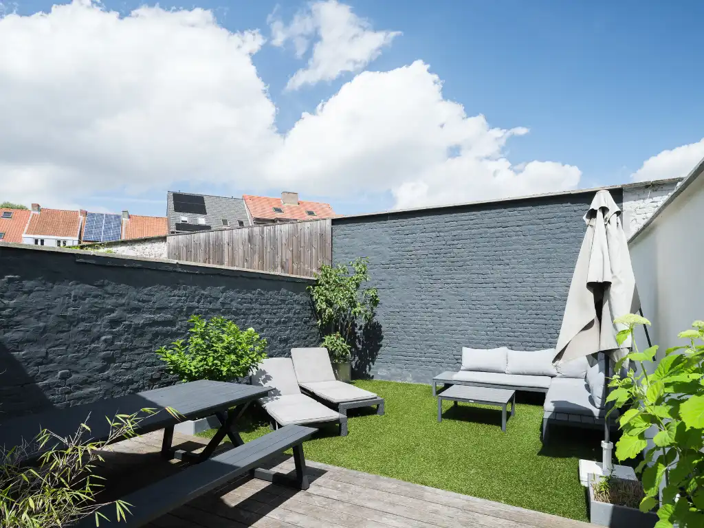 Karaktervolle woning met 4 slaapkamers en zonnige stadstuin op een boogscheut van het centrum van Gent. foto 6
