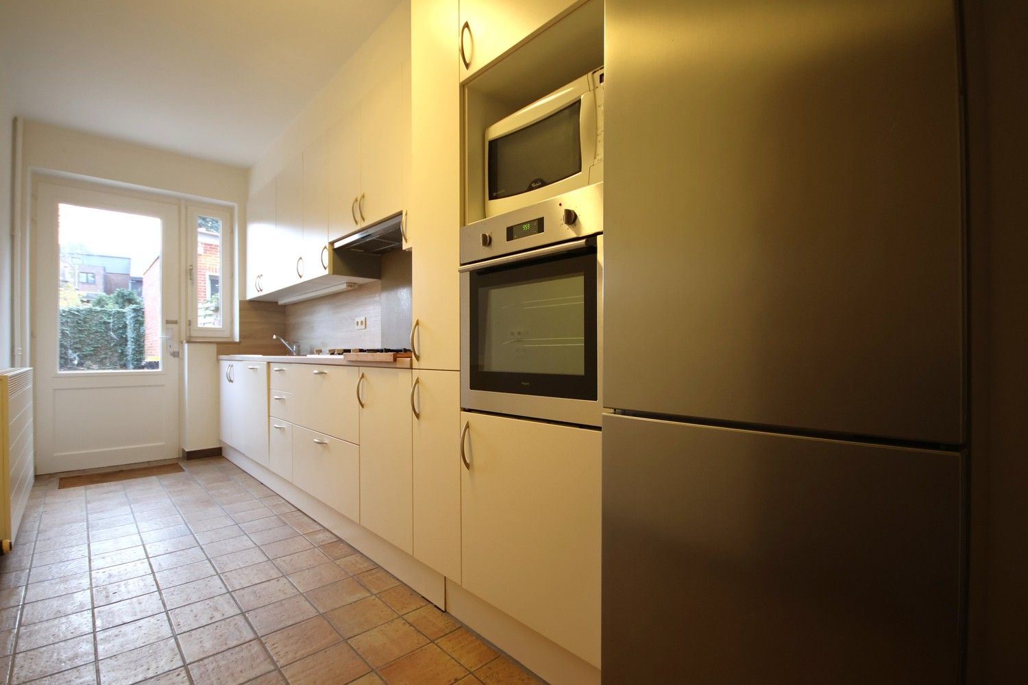 Ruime woning met 3 slaapkamers en tuin midden in het centrum foto 4