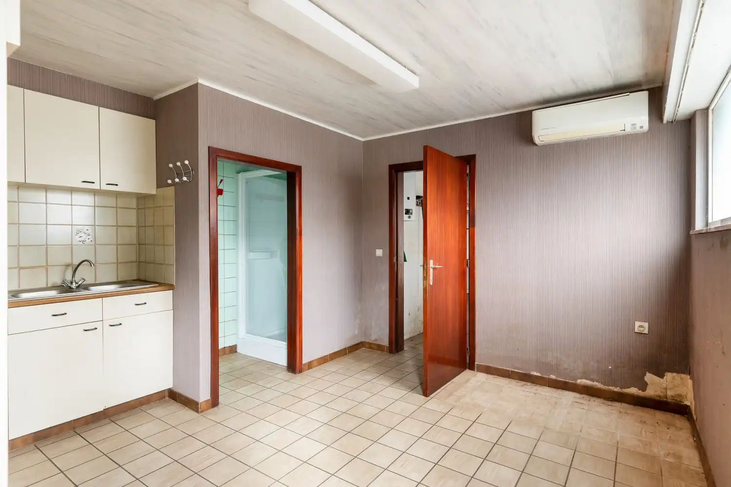 Totaal te renoveren halfopen bebouwing op goede locatie in Lier foto 8