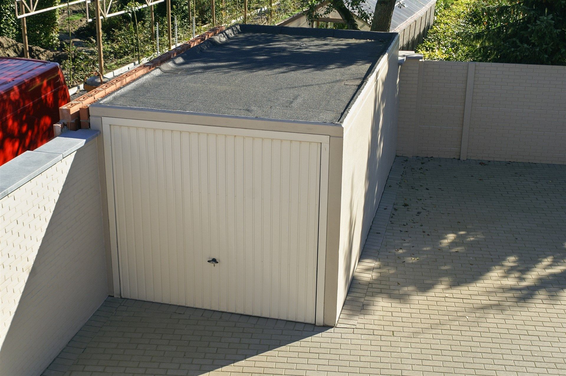 Handelspand met woonst, in centrum overmere met ruime parking en garage.  foto 28