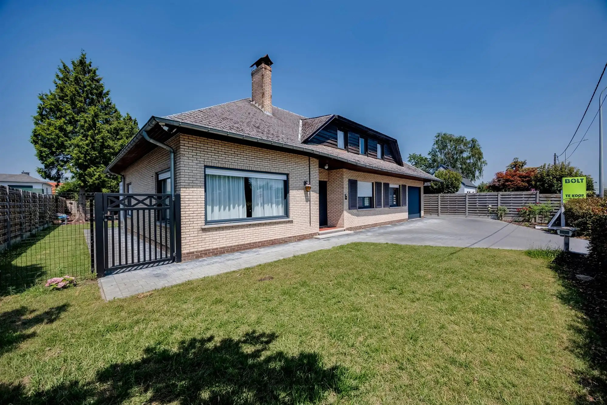 Instapklare villa met 3 slaapkamers, ruime tuin en voldoende parking op gunstige locatie! foto 24