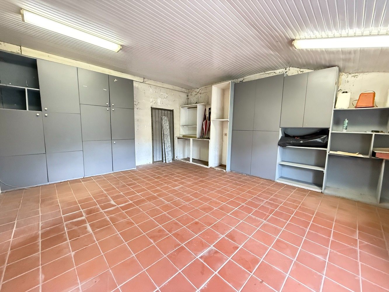 Woning met achterliggend magazijn op 15 are 29 ca. foto 21