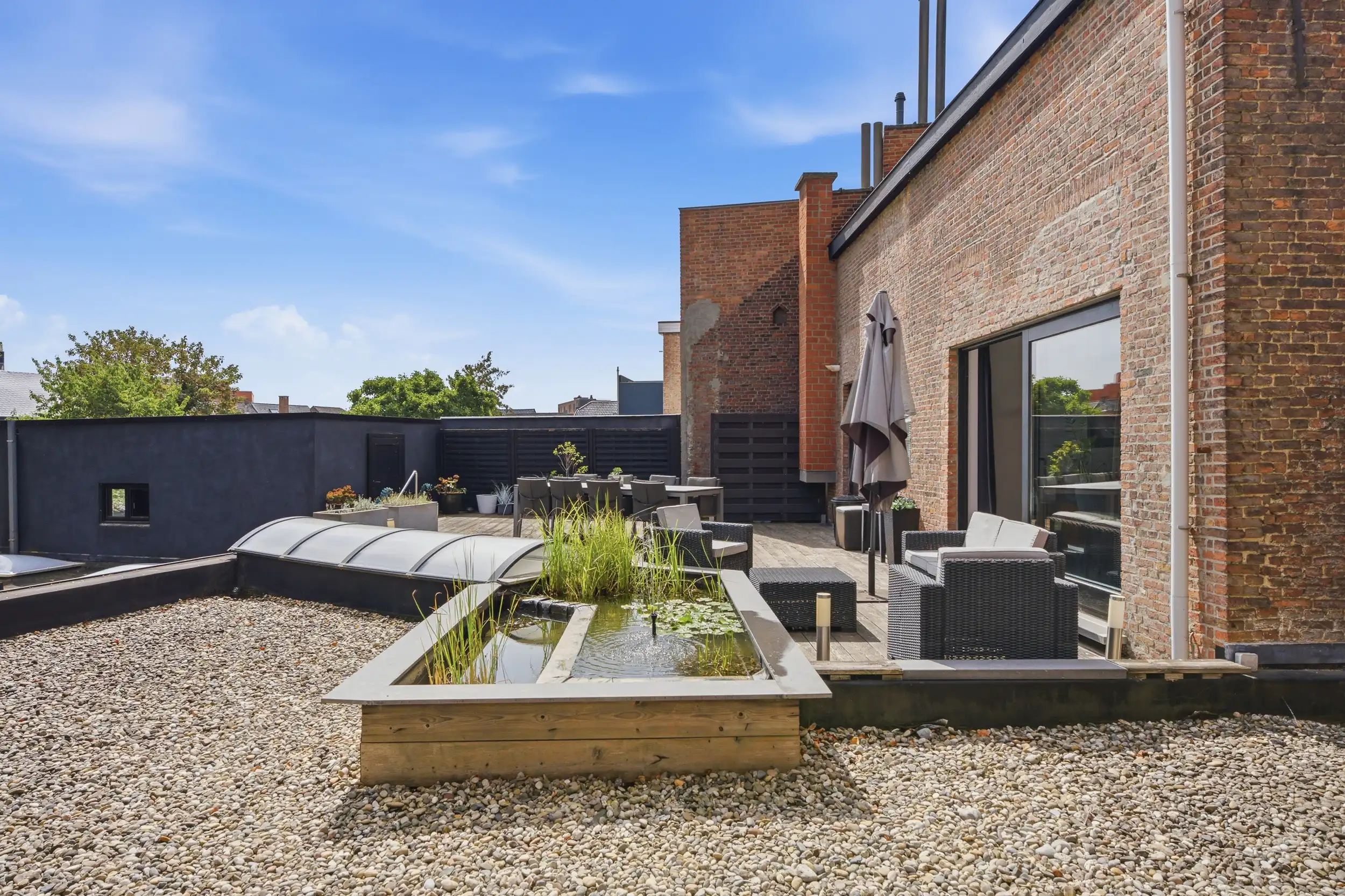 Uniek handelspand met duplex app. en tuin in hartje Wetteren foto 20