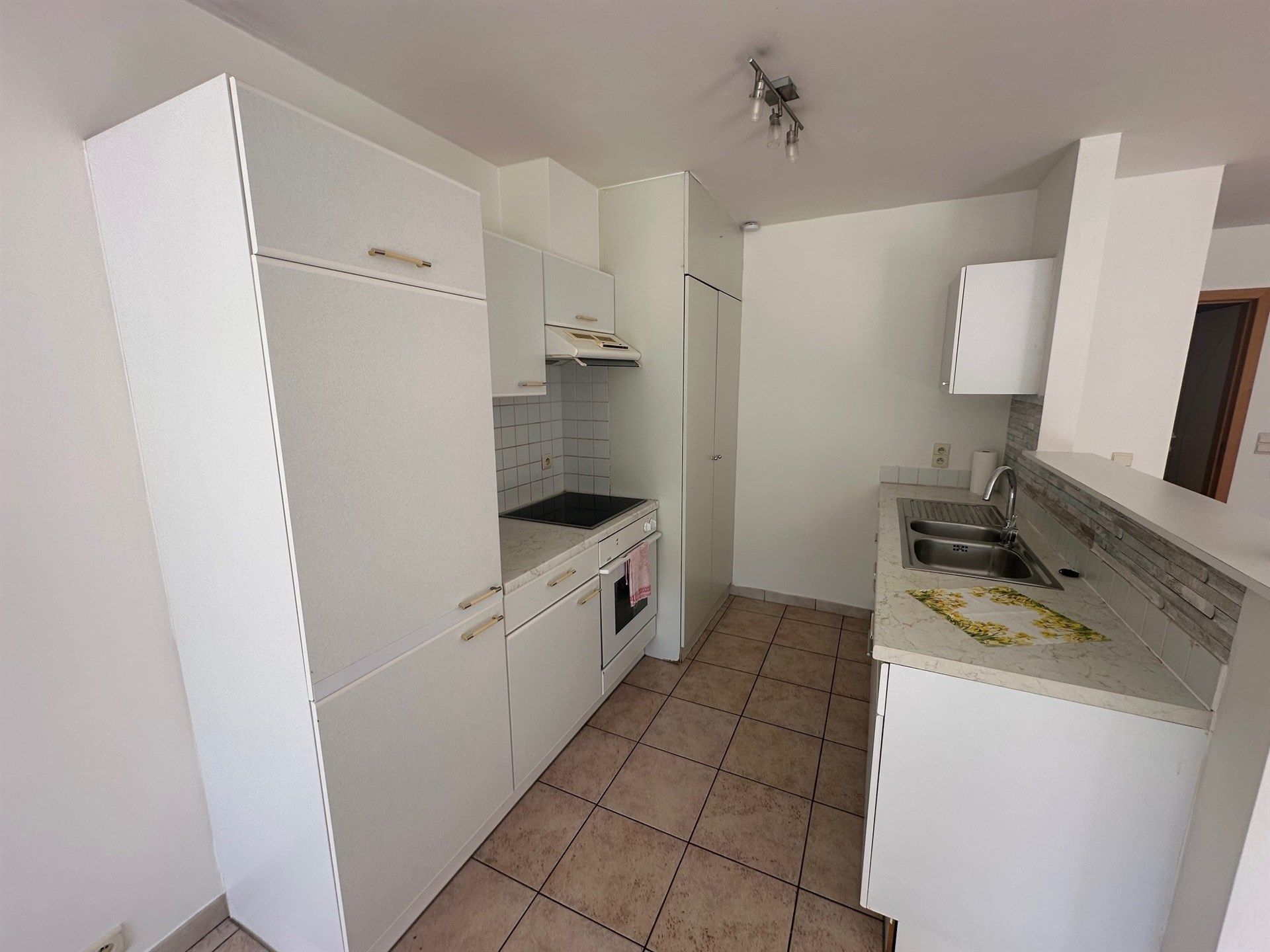 Gelijkvloers appartement met terras en tuin foto 7
