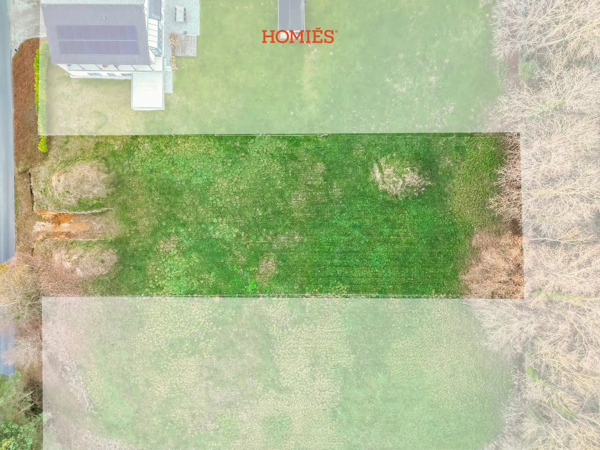 Ruime bouwgrond in groene omgeving foto 2