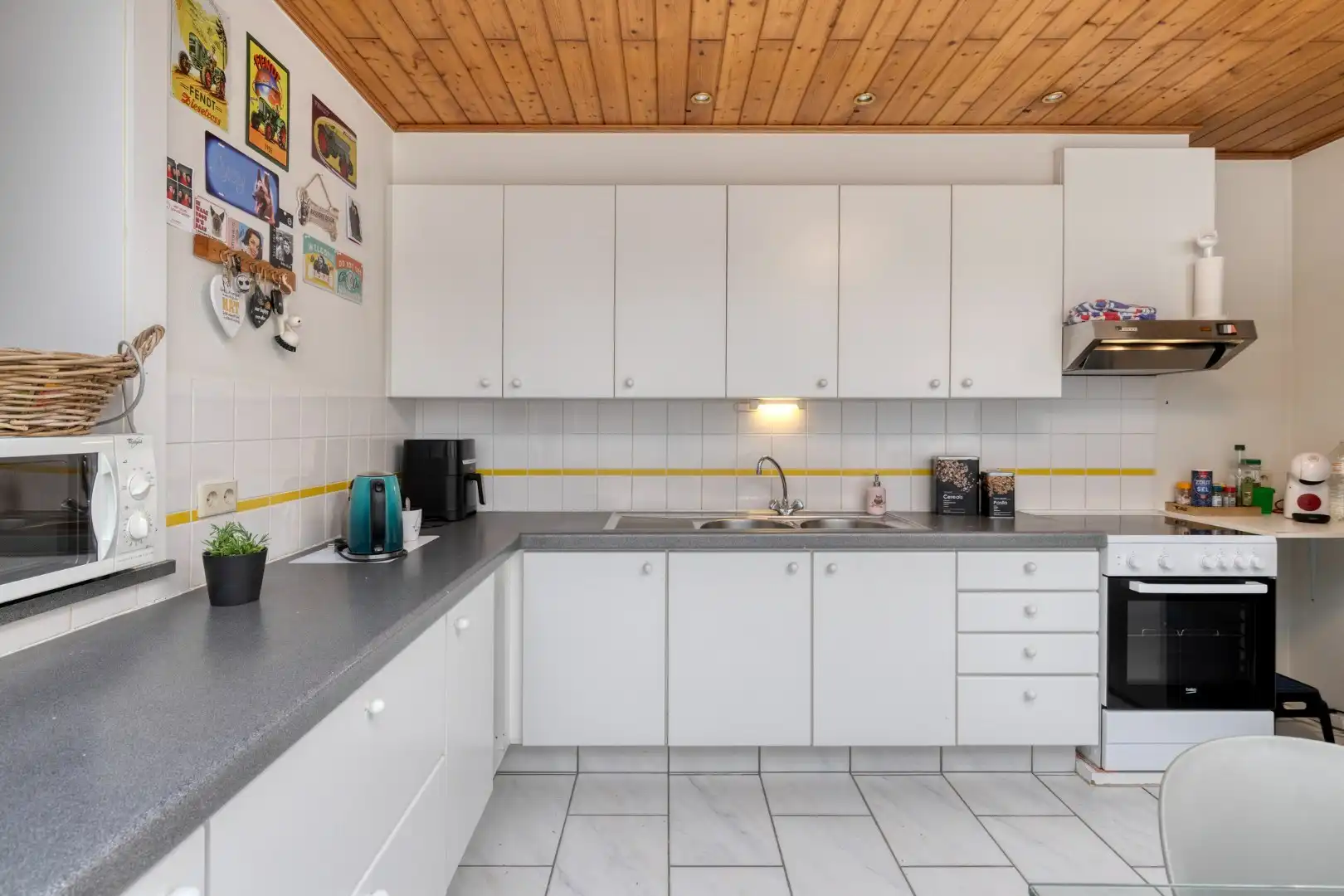 Verzorgde woning met diepe tuin, carport én uitweg! foto 7