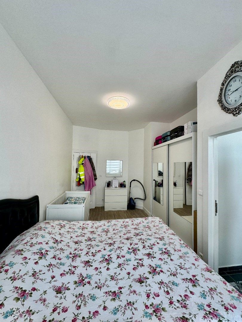 Licht en ruim 2-slaapkamerappartement te koop in Laken foto 21
