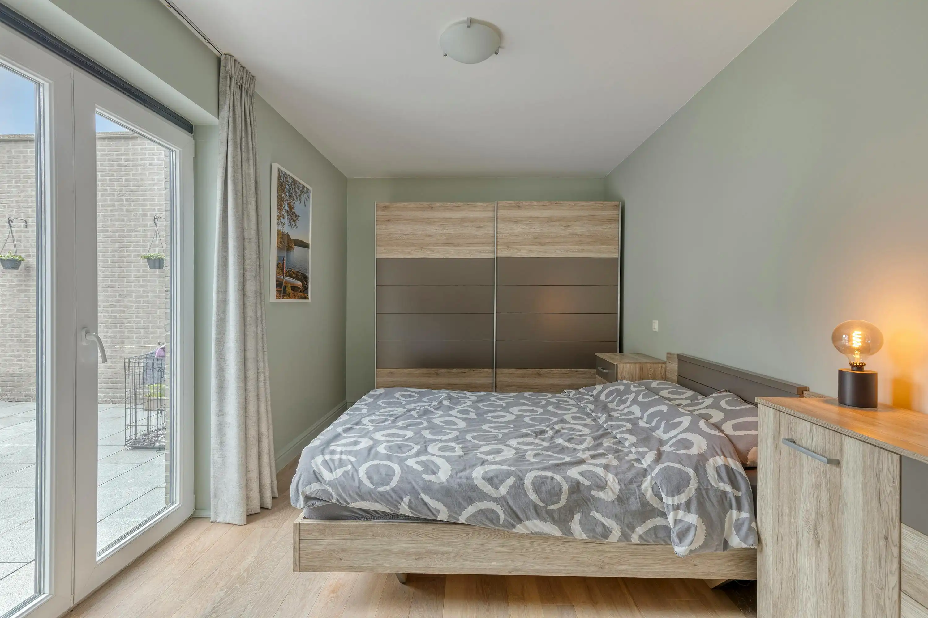 Lichtrijk appartement met 2 slaapkamers en ruime buitenruimte te Zwijnaarde foto 6