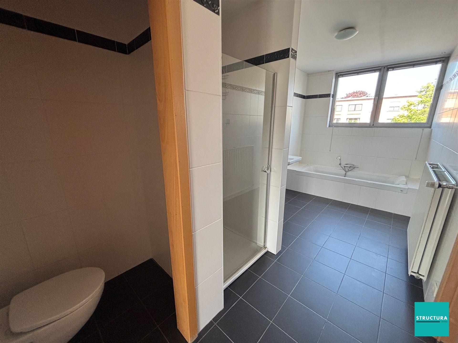 Appartement met 3 kamers en ruime garage in centrum Merchtem foto 12