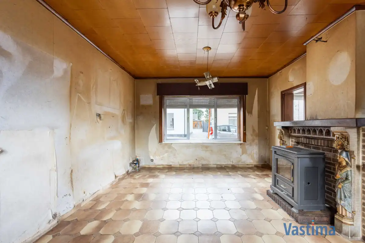 Te renoveren woning met 3 slaapkamers, garage en tuin foto 3