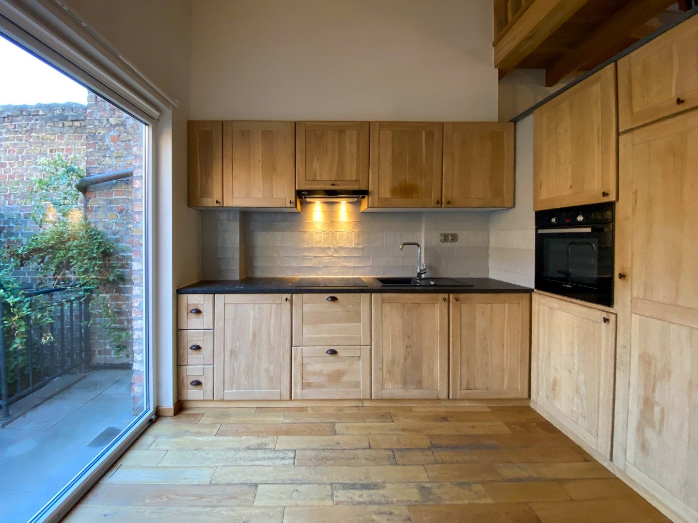 Gezellige rijwoning met 3 slaapkamers en terras. foto 17