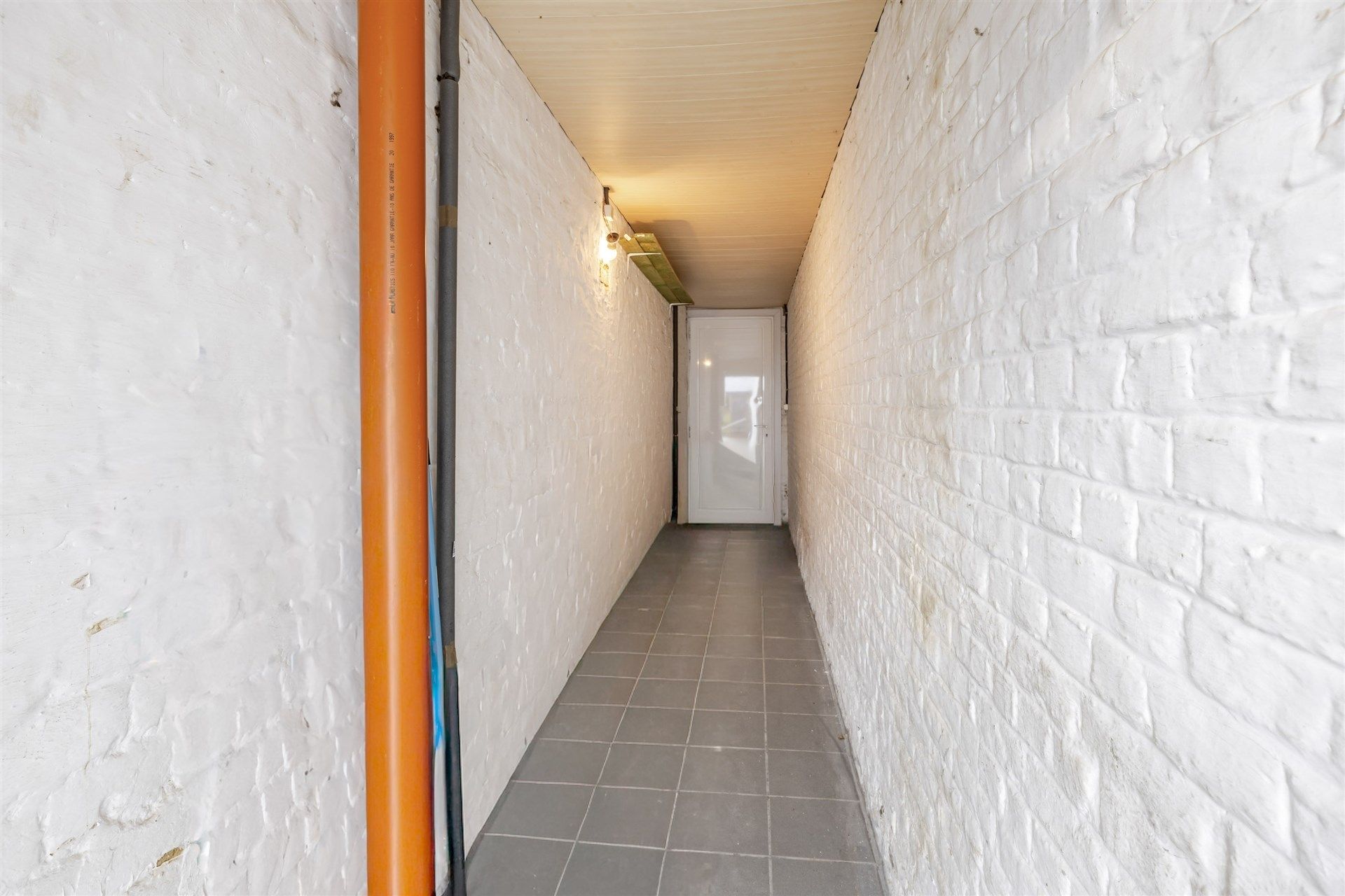 Gezellige rijwoning met uitzonderlijke grote tuin en externe garage in hartje Schellebelle foto 21