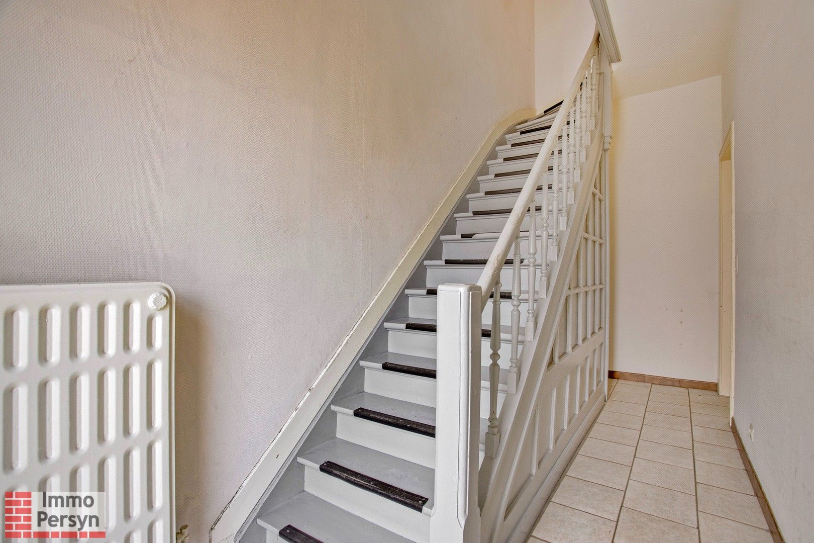 Stadwoning met 3 slaapkamers,  badkamer, 2 toiletten. foto 8