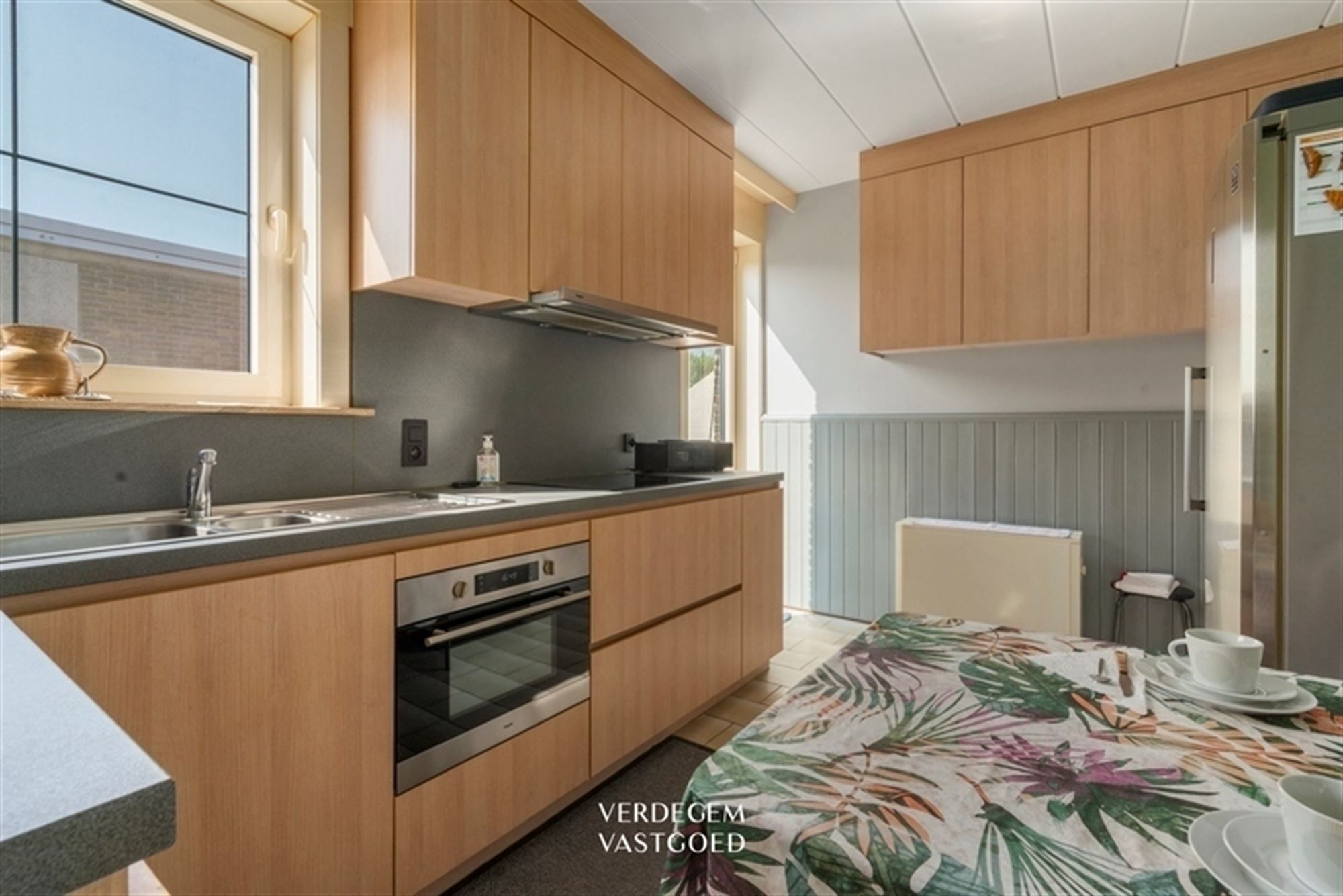 Degelijk appartement met 2 slaapkamers, 2 terrassen en mogelijke aankoop garage foto 4