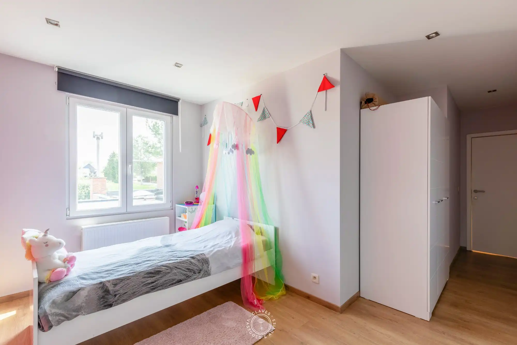 Moderne familiewoning met verrassende buitenruimte foto 19