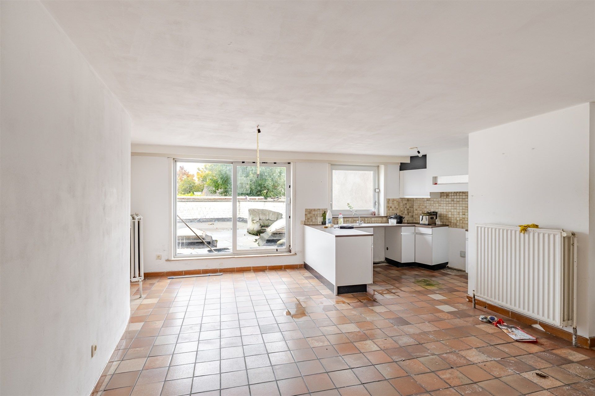 Opbrengsteigendom bestaande uit 2 appartementen + 2 gelijkvloerse autostaanplaatsen foto 6