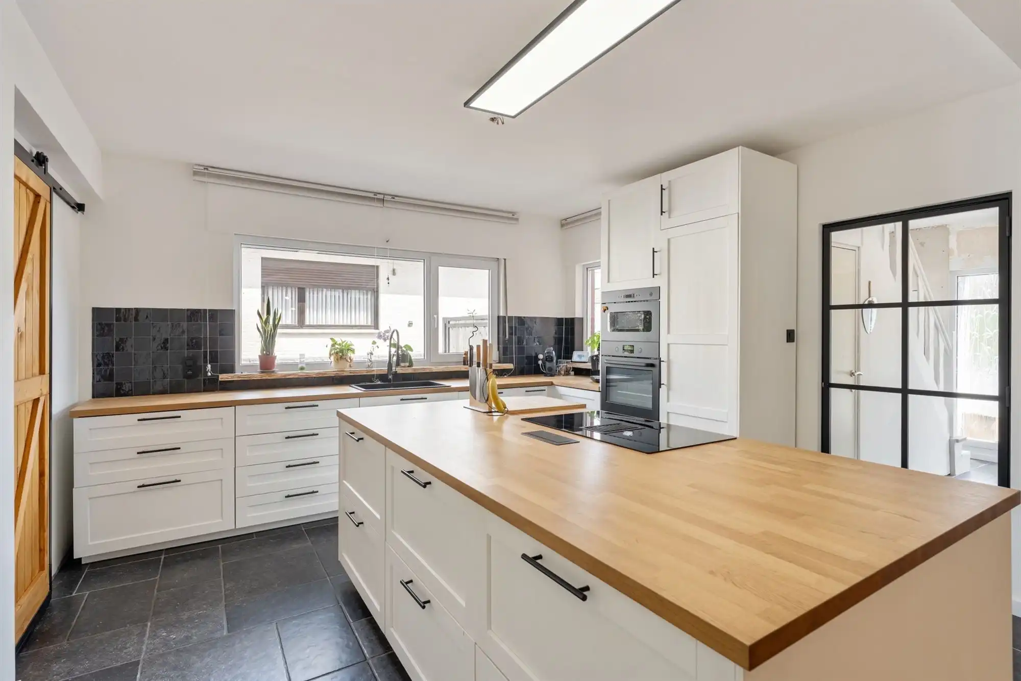 Gerenoveerde halfvrijstaande woning op perceel van 5a 57ca te Neeroeteren foto 8