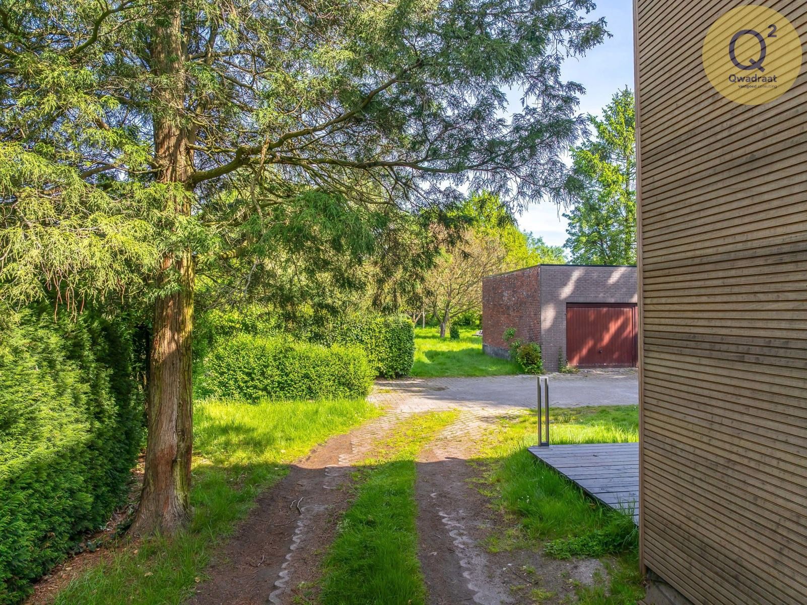 Ruime vernieuwde woning met 4 slpks en grote tuin foto 45