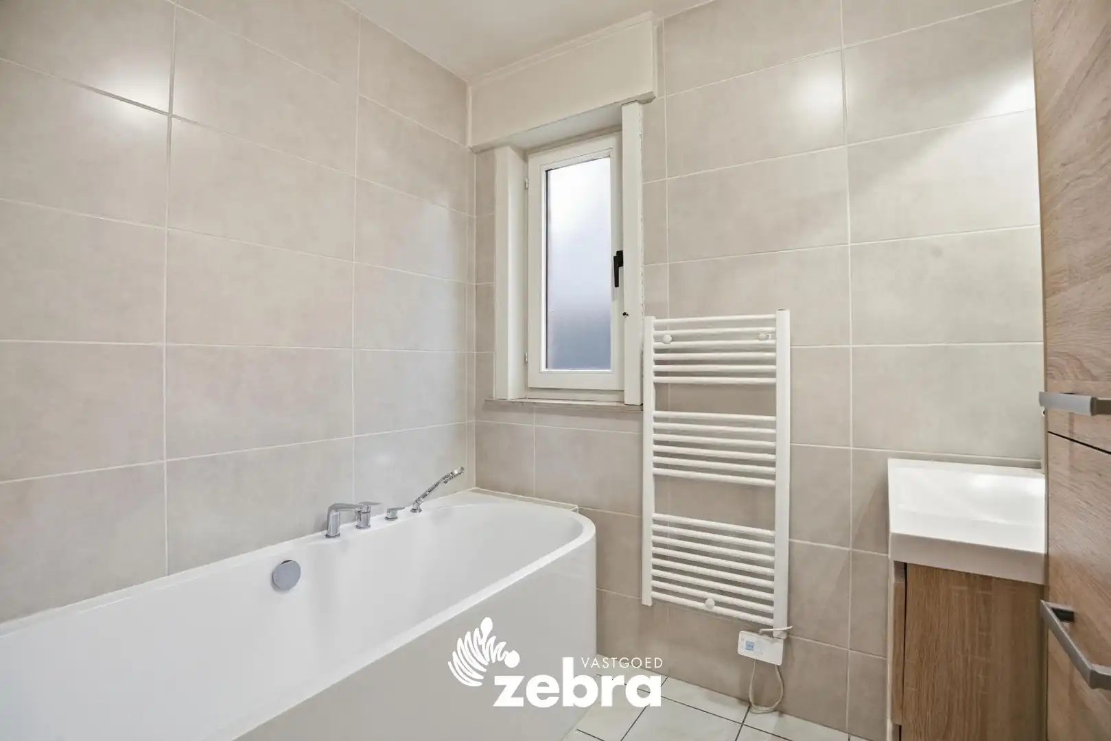 Instapklaar gelijkvloers appartement met tuin van 116 m² en garage! foto 12