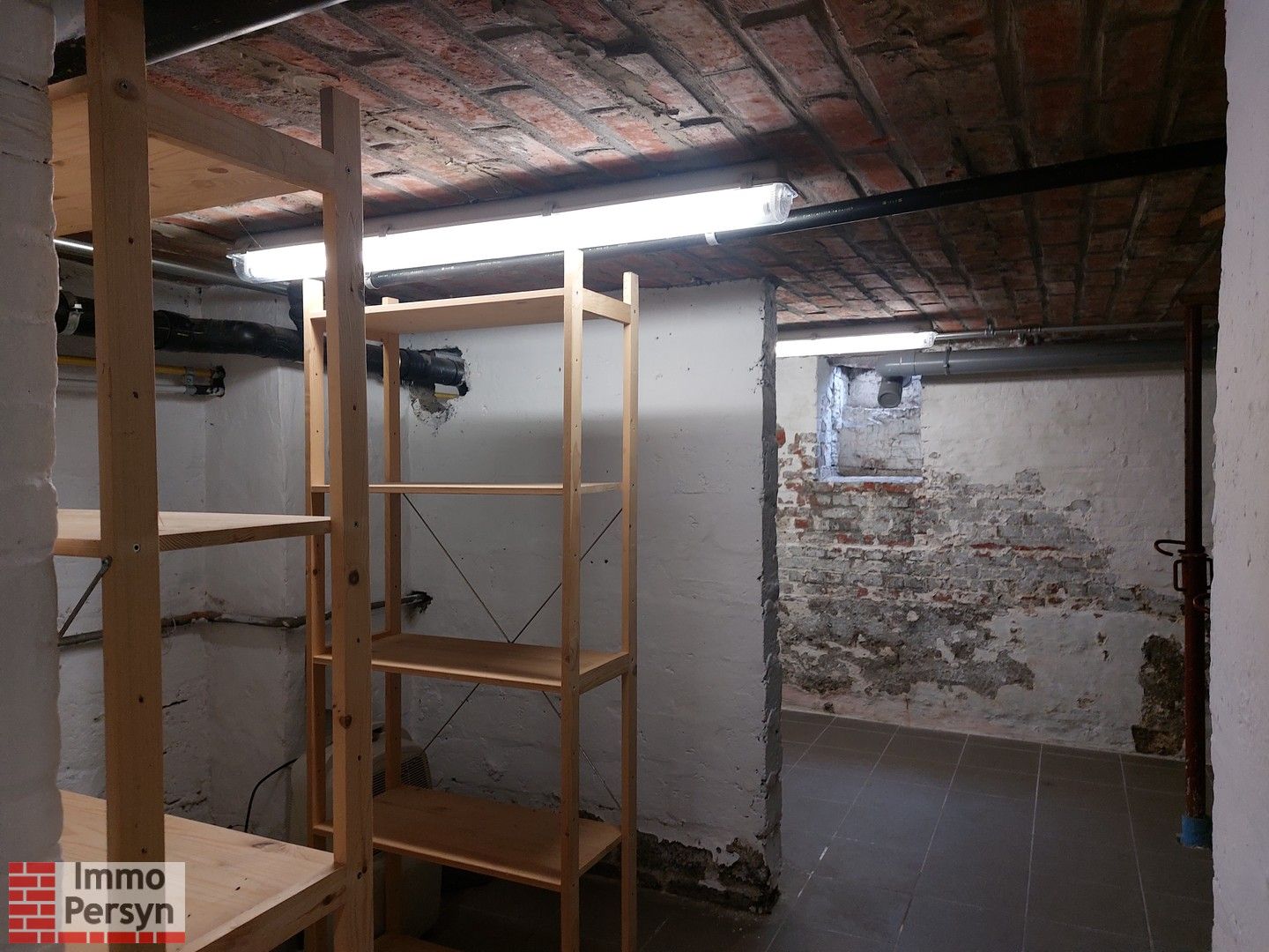 Gezellige rijwoning met kleine stadstuin foto 27