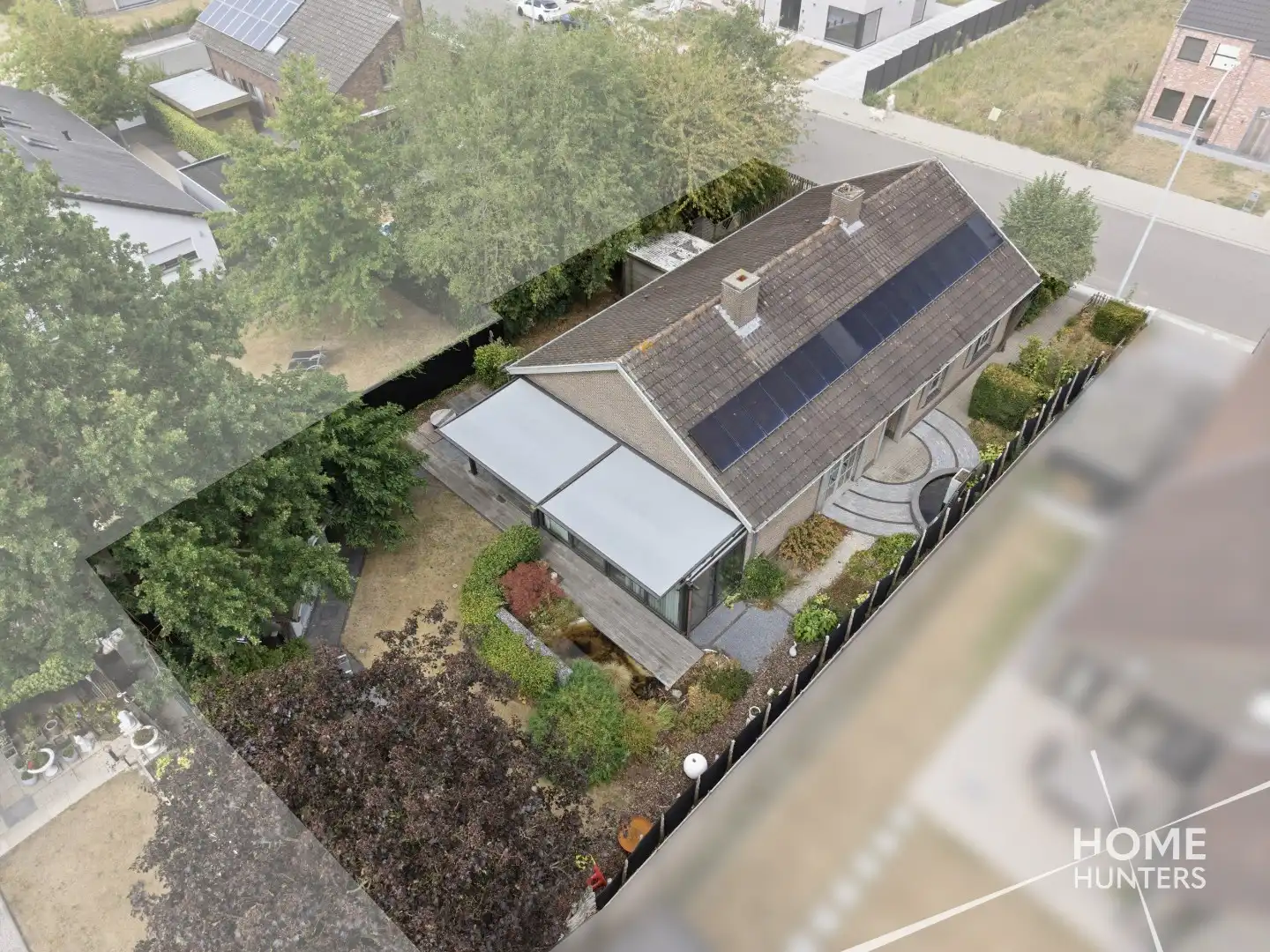 Alleenstaande woning met prachtige tuin en tal van extra troeven in een rustige wijk te Wervik foto 3