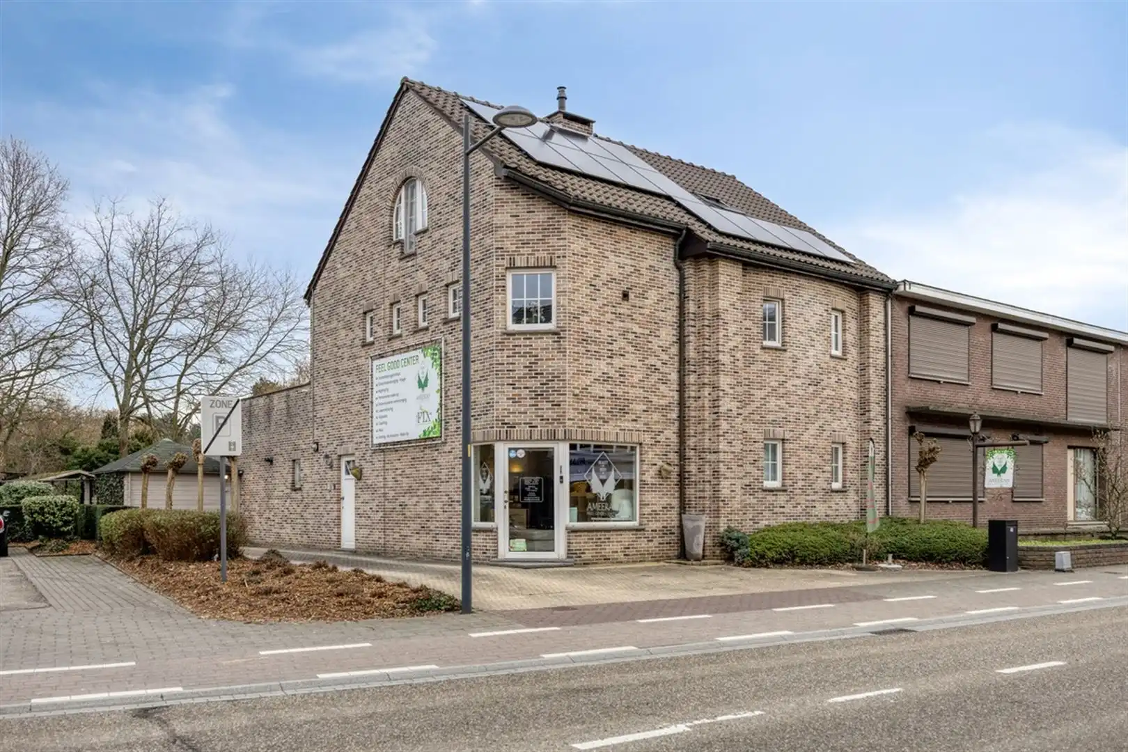 TE KOOP: Handelshuis op toplocatie te Heusden-Zolder! foto {{pictureIndex}}