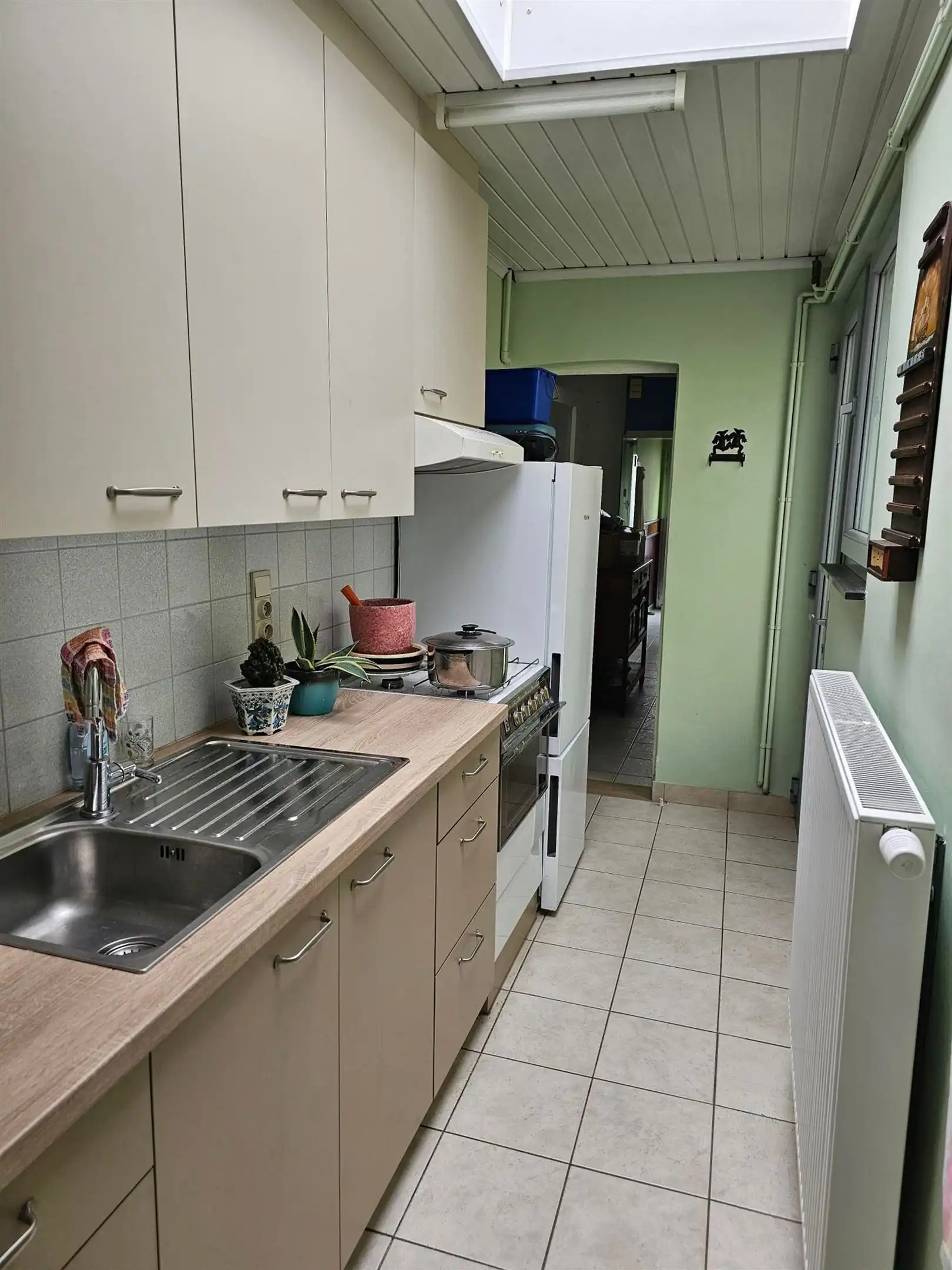 Rustig gelegen starters -of investeringswoning met zonnige koer en 3 slaapkamers. foto 7