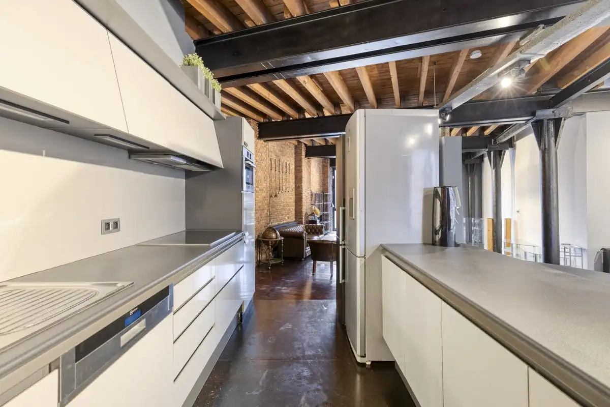 Industriële duplexloft met karakter in Gent foto 9