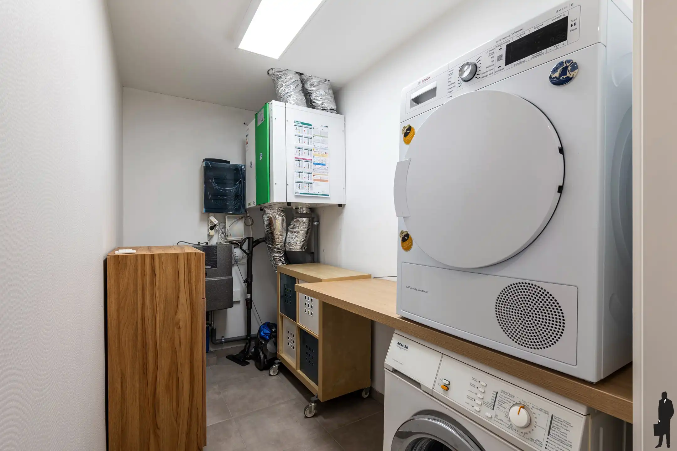 Instapklaar gelijkvloers appartement met tuin en carport foto 11