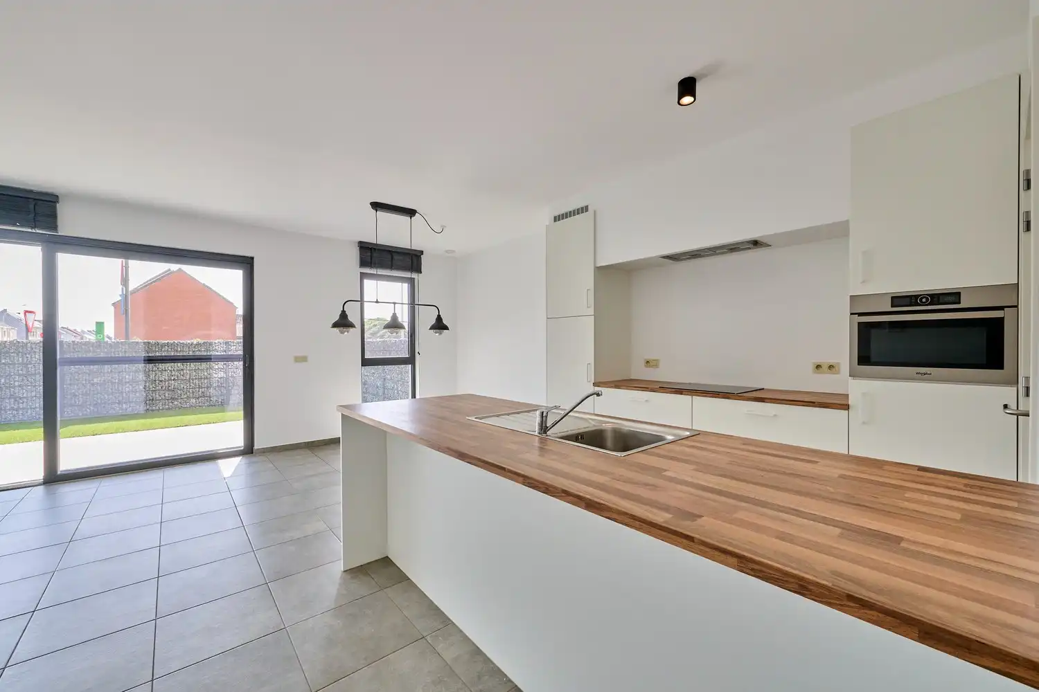 Stijlvol gelijkvloers appartement met zongerichte tuin - EPC11! foto 5