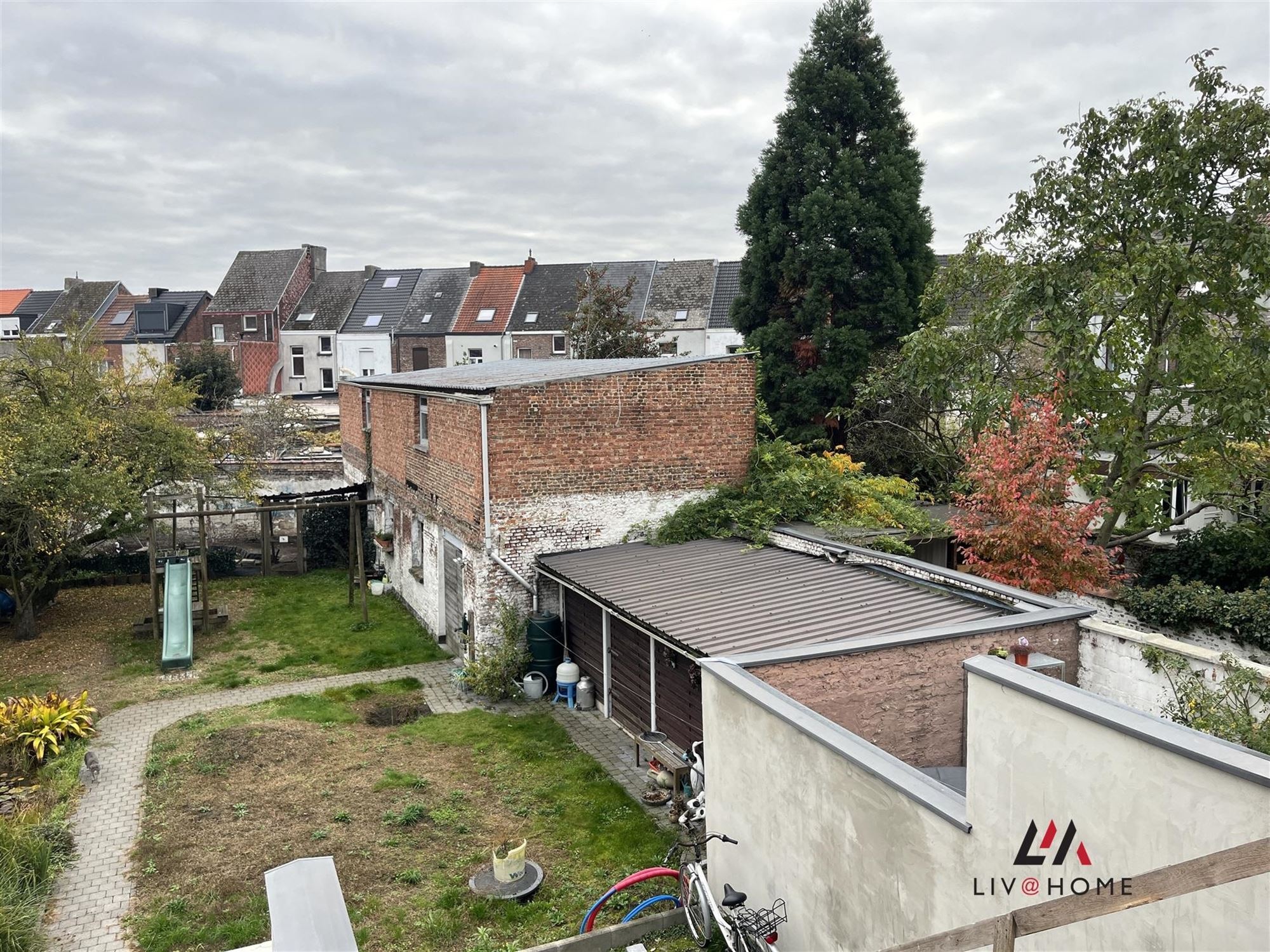 2 aangrenzende rijwoningen met gemeenschappelijke tuin foto 26