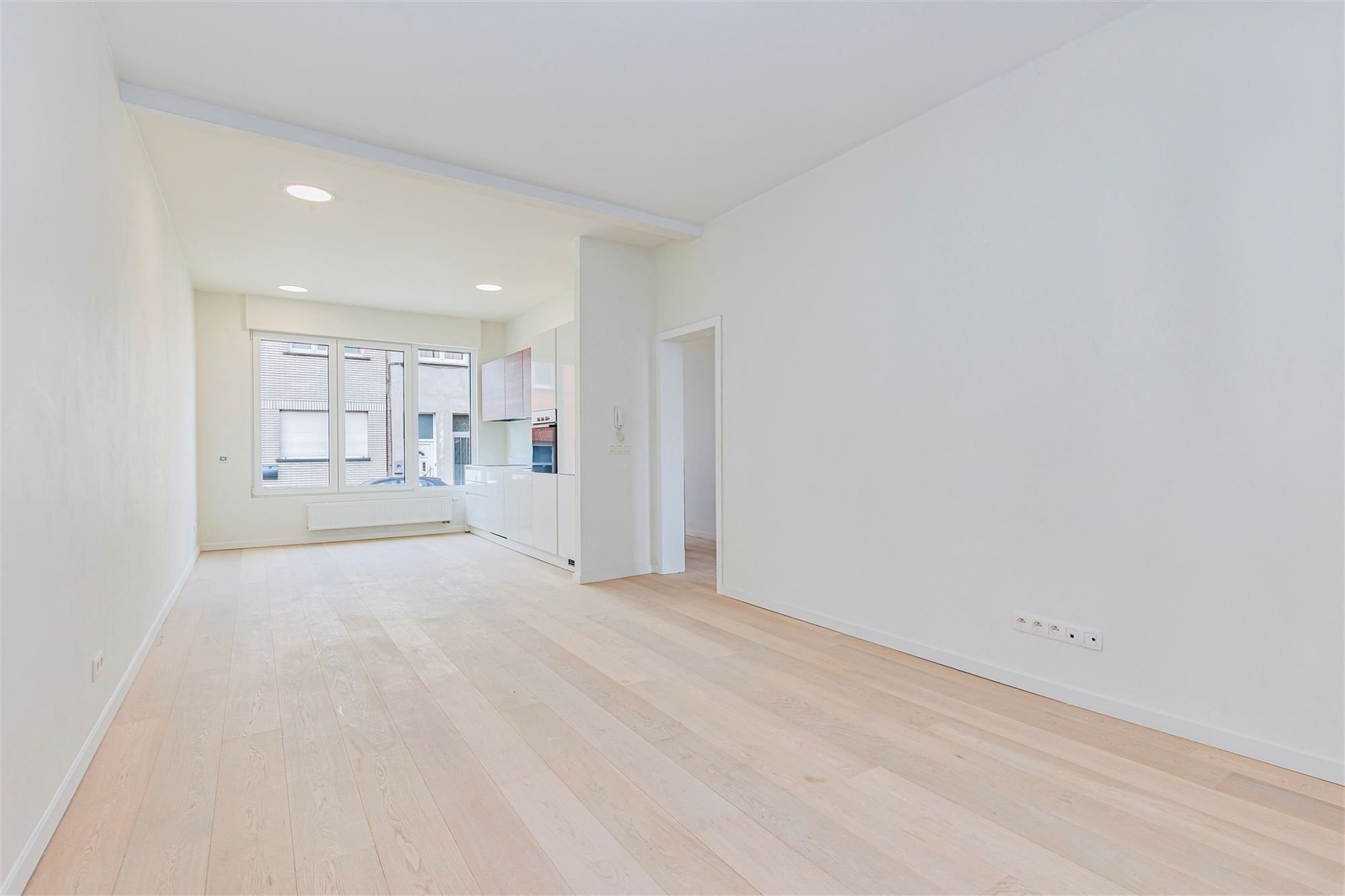 Gelijkvloers duplexappt met 3 slk + tuin foto 12