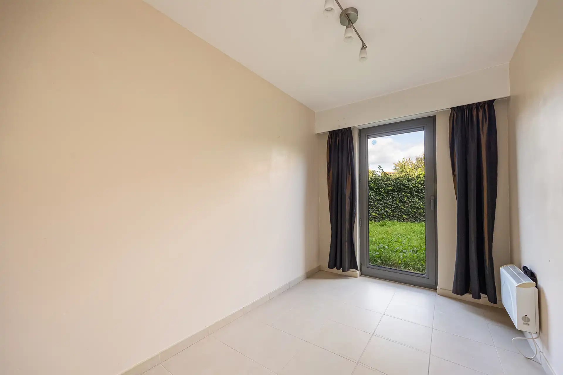 Ruim gelijkvloers appartement (Bj 2005) met 2 slpk en tuin foto 10