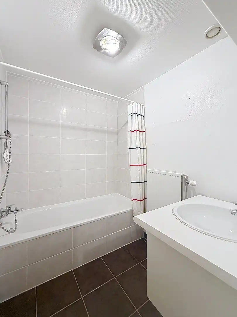 Zongericht appartement met terras in het stadcentrum doch in een oase van groen foto 8