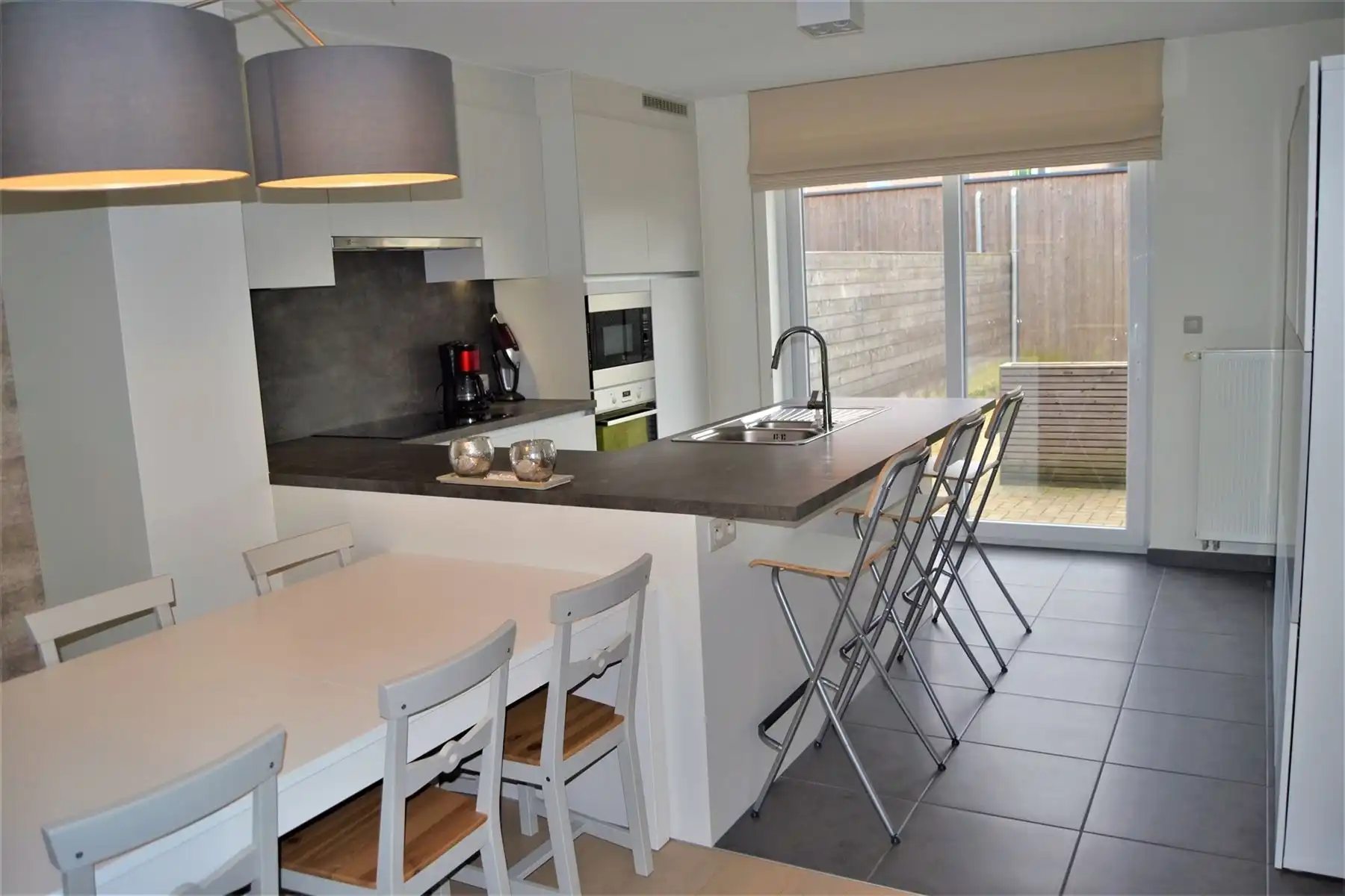 Recente instapklare woning met tuin foto 7