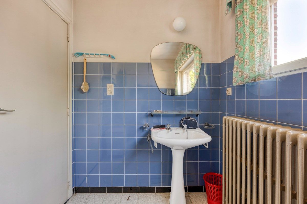 Gelijkvloerswoning met oa 3 slaapkamers in een rustige doodlopende straat. foto 17