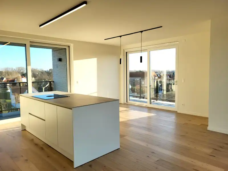 2-slaapkamer dakappartement met ruime zongerichte terrassen foto {{pictureIndex}}