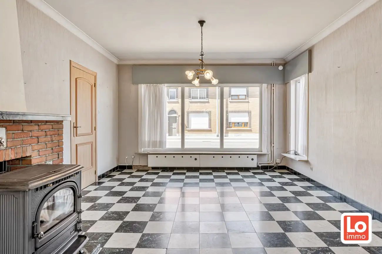 Verder te renoveren halfopen woning en afzonderlijke dubbele garage en stadstuin op een gemakkelijk bereikbare locatie in Hamme! foto 6