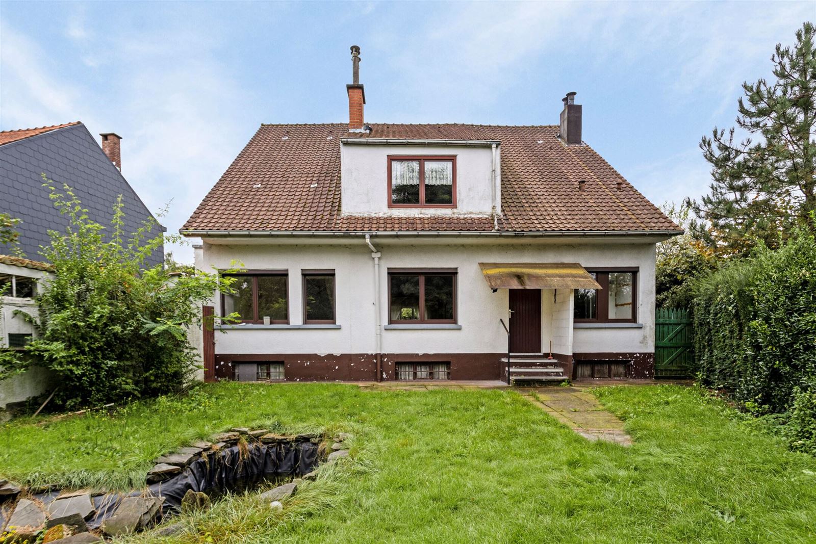 Te renoveren 4- gevel woning op 11are te Beersel  foto 31