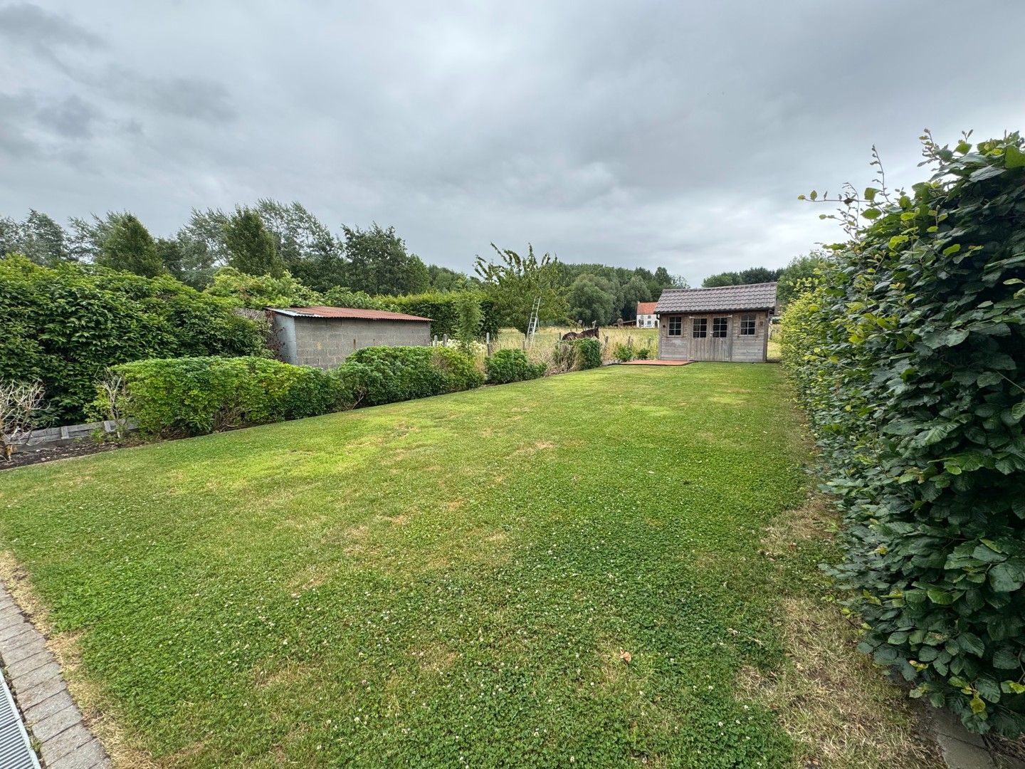 Mooie halfopen gezinswoning met zicht op Ename bos foto 7