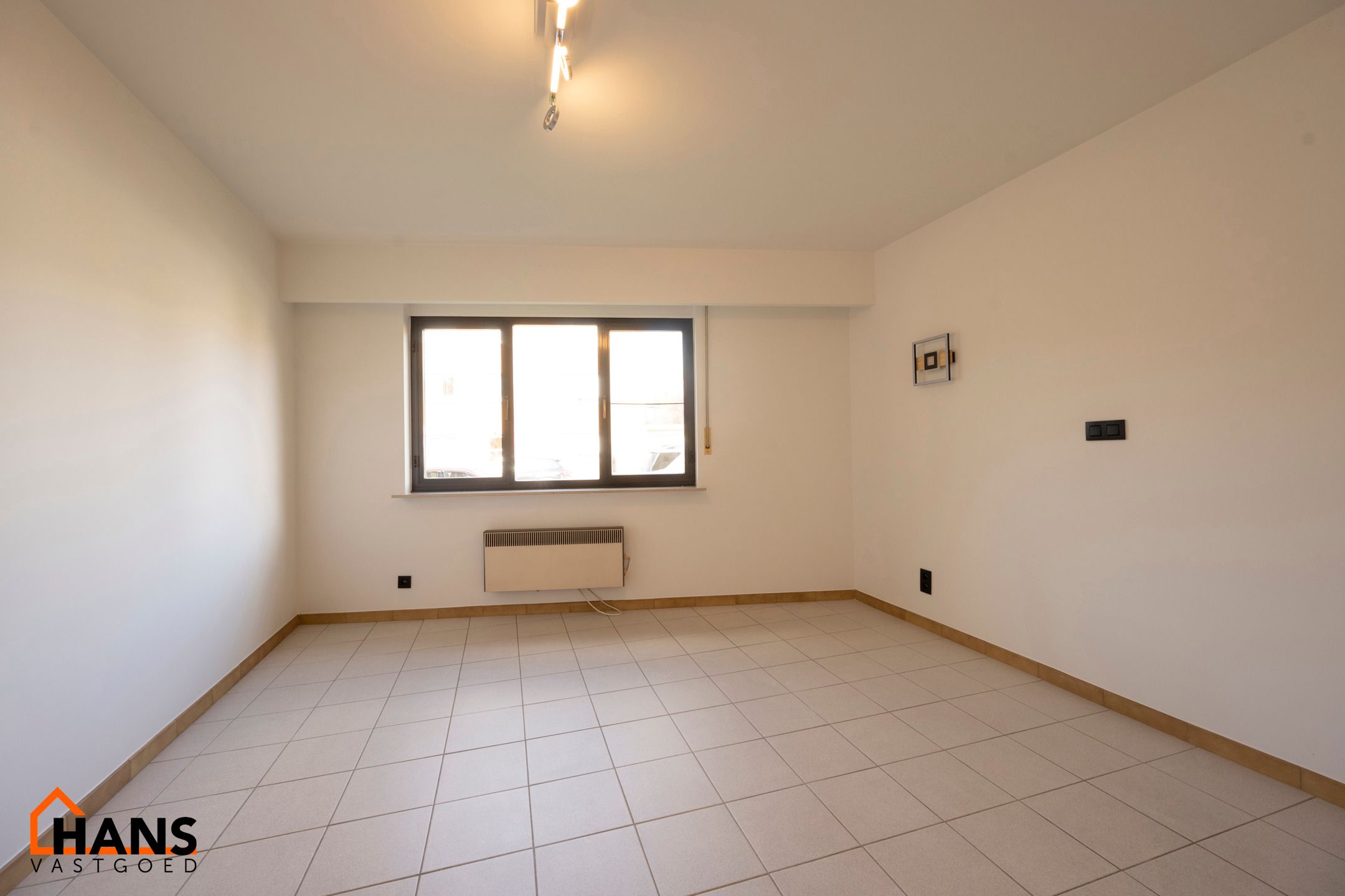 Gelijkvloersappartement deels gerenoveerd. foto 9