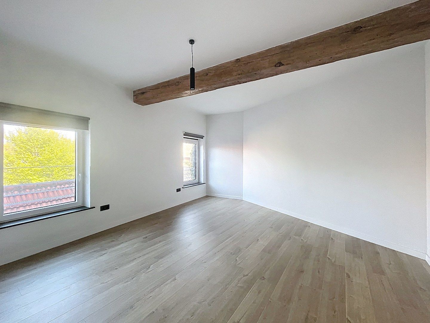 Ruim gerenoveerd appartement in hartje Hoegaarden foto 12