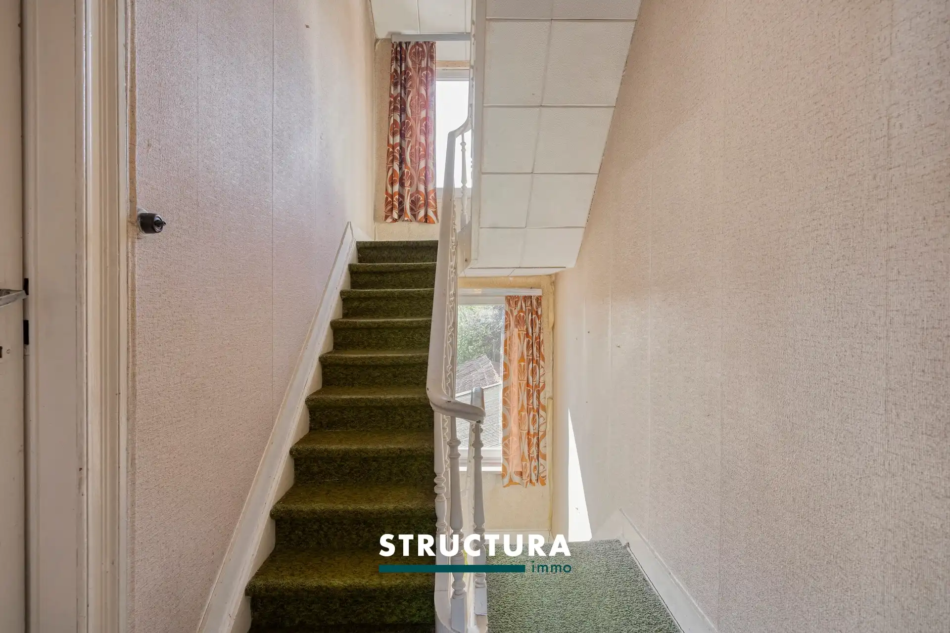 Centraal gelegen renovatiewoning met tuin foto 12